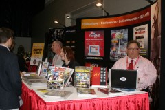 Tim Sendelbach, Shannon Pieper, and Paul Andrews at the Fire Rescue Magazine Booth