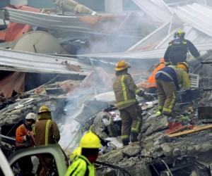Rescue workers search for NZ victims