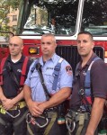 Firefighters from Ladder 107, (L to R) FF Justin Tallett, Lt. Christopher Bedard and FF Frank Blackstone.