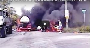 sheriff deputies save woman from burning car